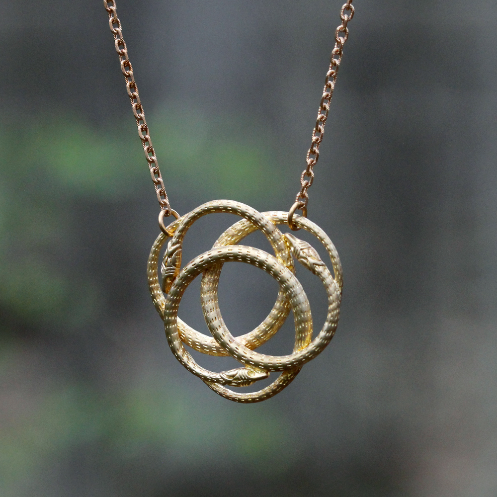 We Dream In Colour Brass Snake Knot Necklace